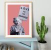 Banksy Love Is The Answer Red Framed Print