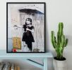 Banksy Umbrella Girl Framed Print